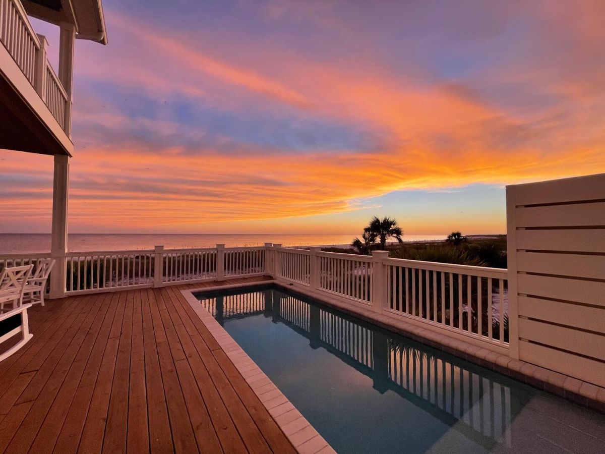 Manly's Beach House pool sunset